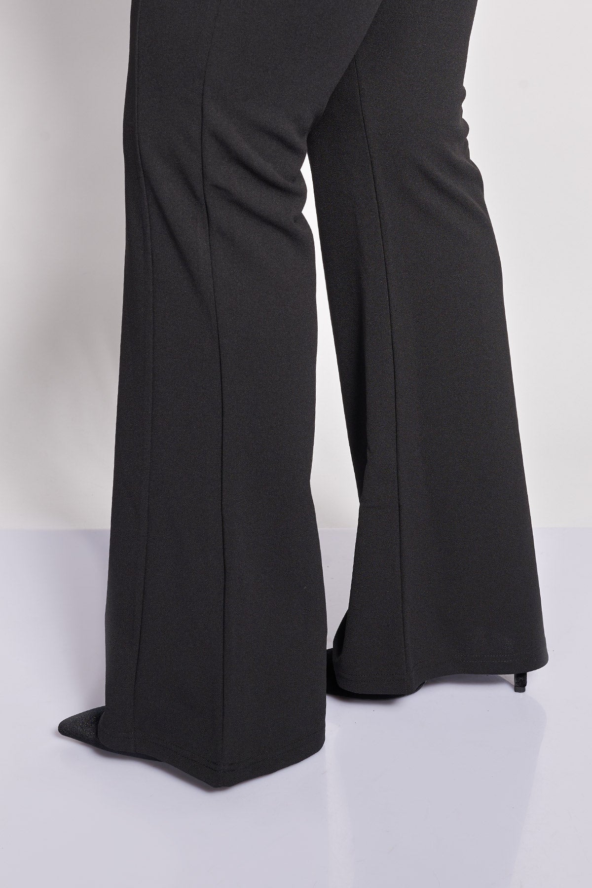 Crepe flare trousers with decorative metallic buttons - Black