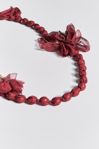 Fabric necklace with covered beads, decorative flowers, and ribbon tie - Bordeaux