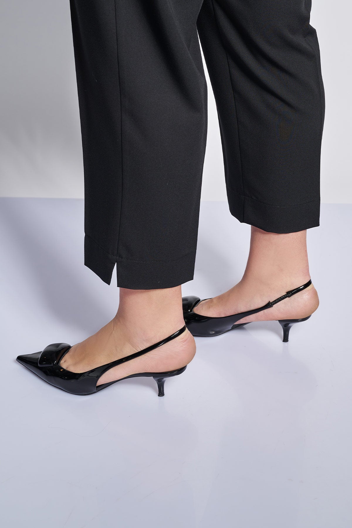 Peg twill TR pants with metal buckles on the waistband - Black