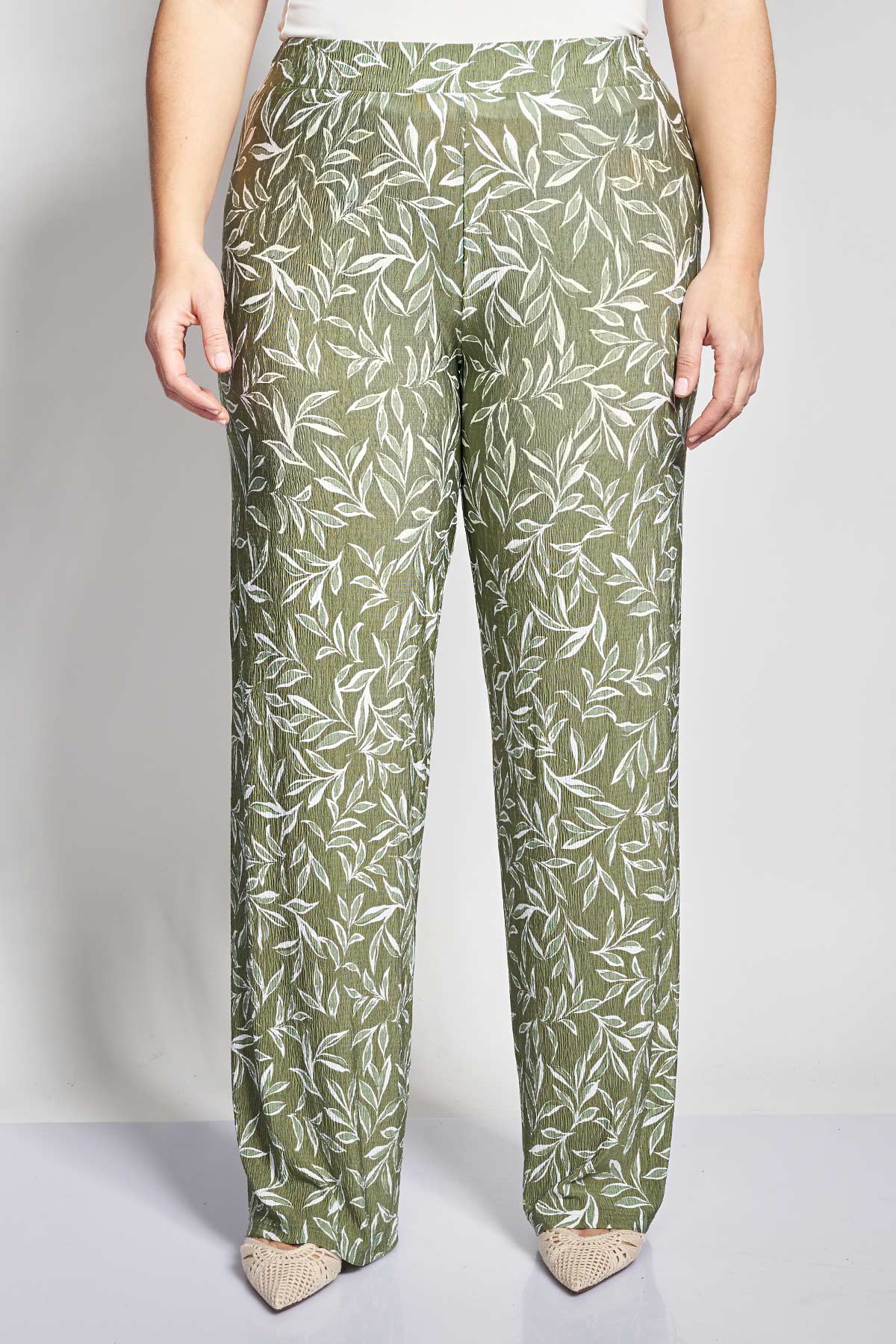 Jersey trousers with textured finish and floral pattern - Khaki